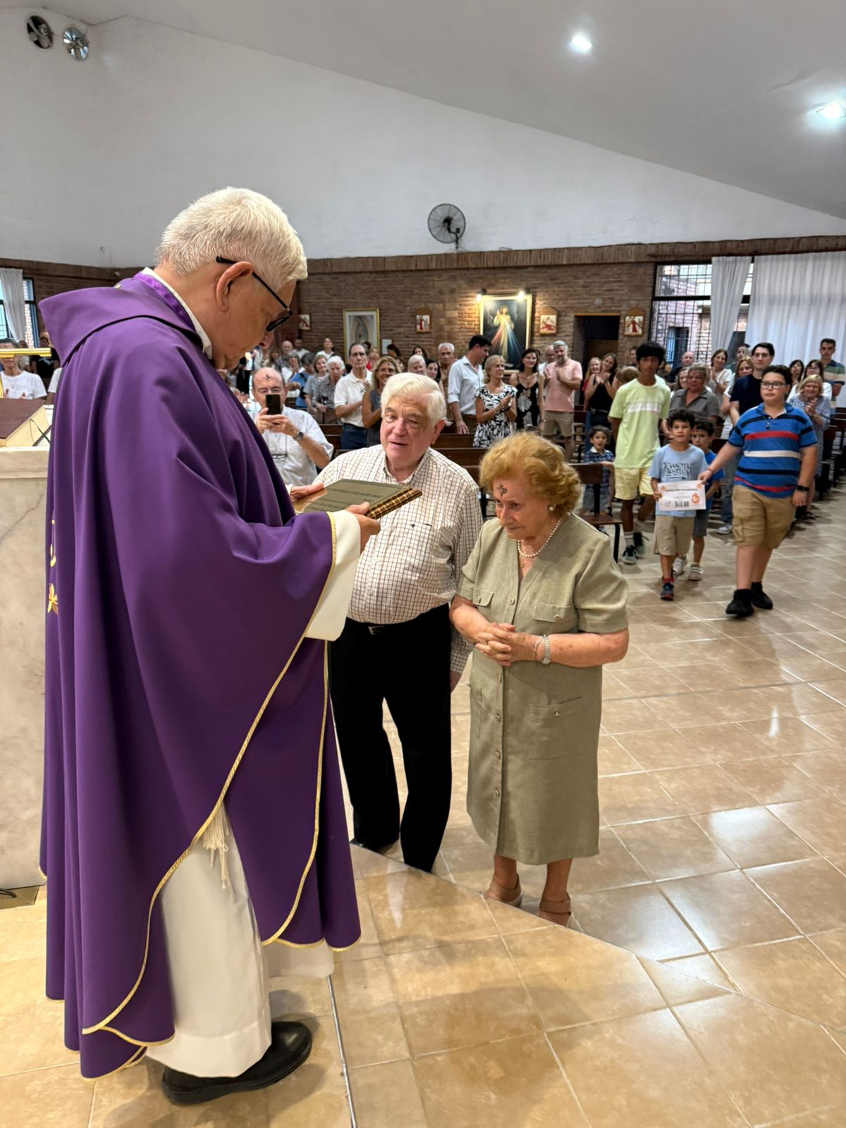 Reconocimiento al Padre Carlos Malagueño 1